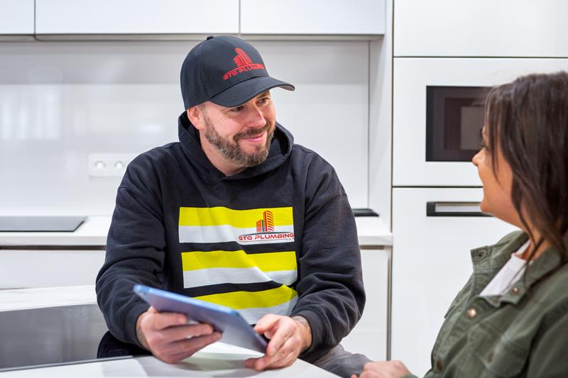 GTG Plumber providing an estimate to a homeowner